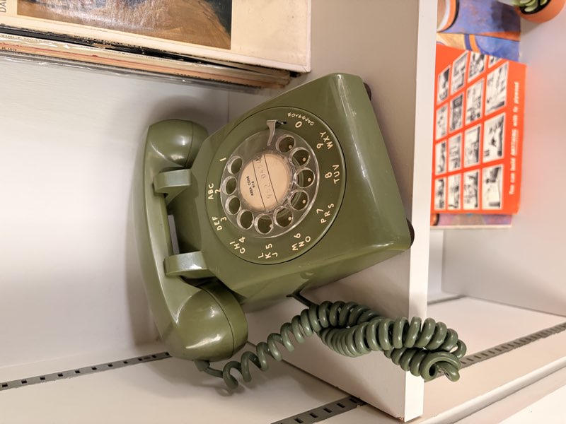 HelloHistory rotary phone installed on a shelf