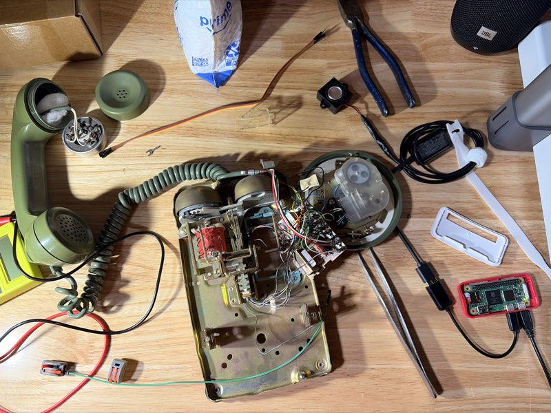 HelloHistory rotary phone disassembled on a workbench